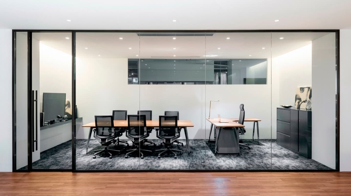 Network rack and conference-room AV equipment installed as part of the office build-out